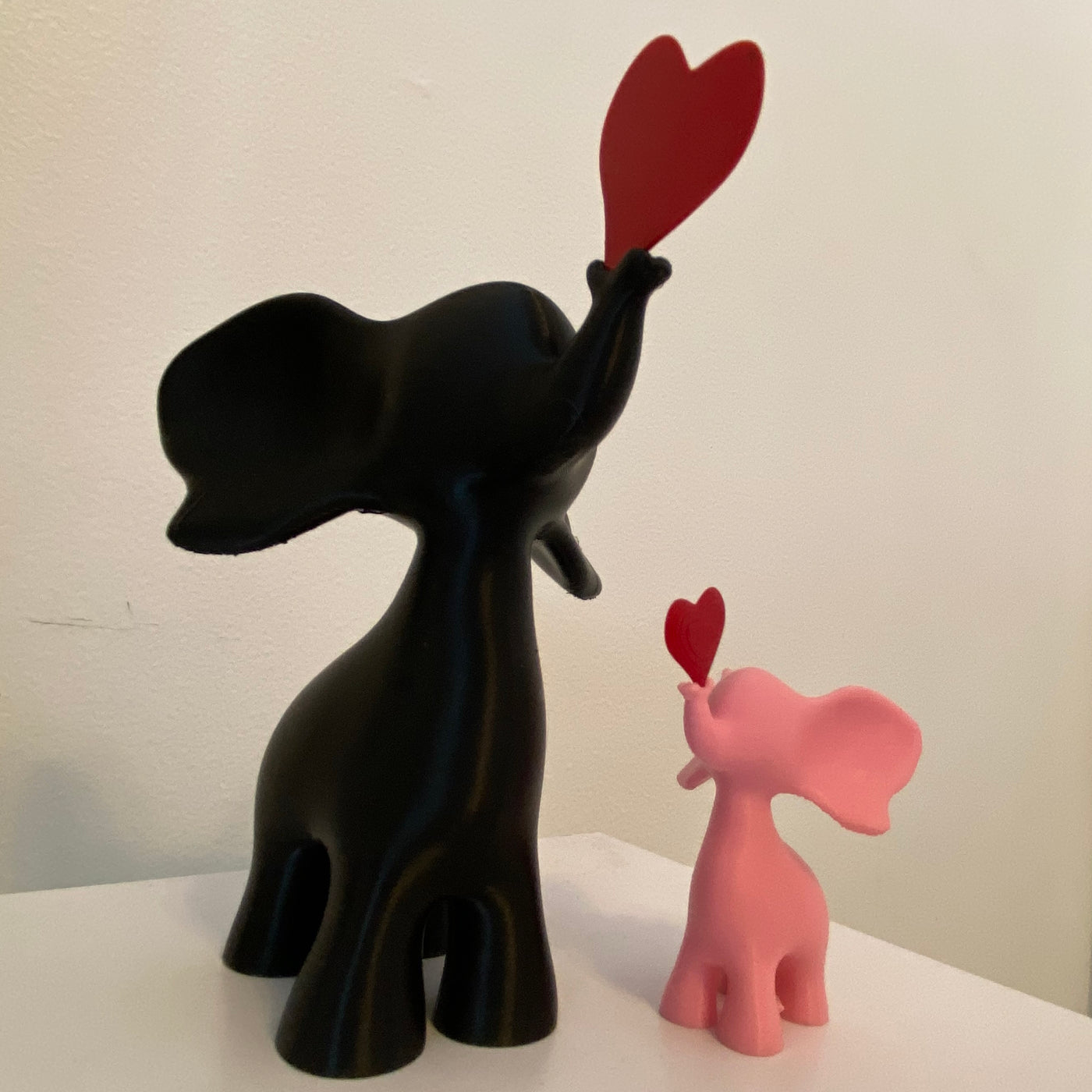 Playful Elephant Heart Sculpture