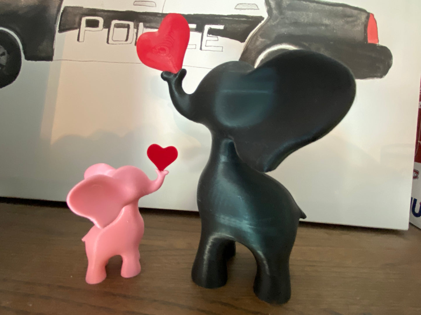 Playful Elephant Heart Sculpture